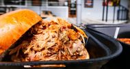 Oak-Smoked Pulled Pork Sandwich from MISSION BBQ (Image via Instagram/@missionbbq)
